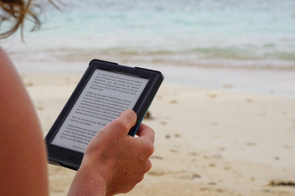 looking over the shoulder of someone reading on a Kindle device.